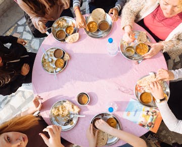 IVHQ volunteers eat a meal in Delhi India